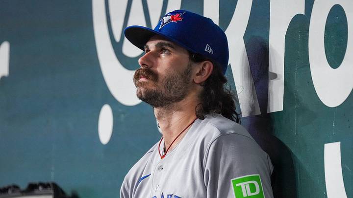 Sep 18, 2026; Arlington, Texas, USA;  Toronto Blue Jays pitcher Dylan Cease (84) sits in the dugout after being relieved in the third inning after pitching 2 2/3 innings, with six walks and three strike outs against the Texas Rangers at Globe Life Field. Mandatory Credit: Raymond Carlin III-Imagn Images