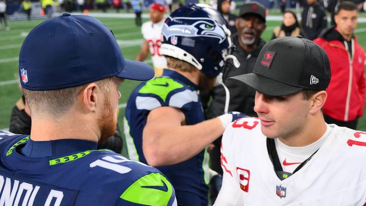 Seattle Seahawks quarterback Sam Darnold (14) and San Francisco 49ers quarterback Brock Purdy 