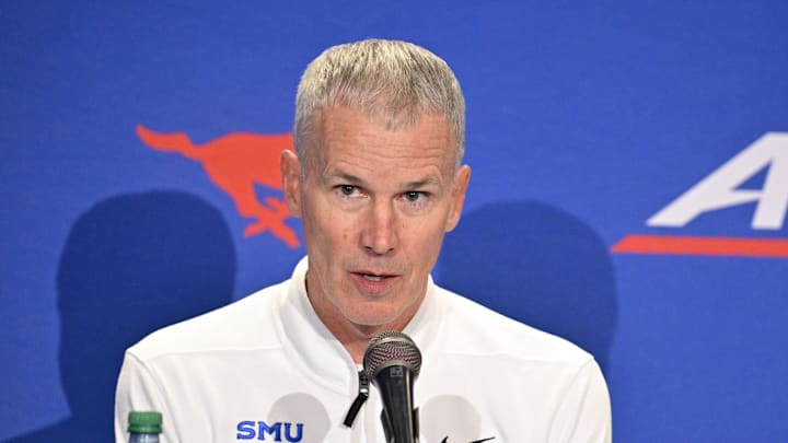 Feb 11, 2025; Dallas, Texas, USA; Southern Methodist Mustangs head coach Andy Enfield talks to the media after the game between the Southern Methodist Mustangs and the Pittsburgh Panthers at Moody Coliseum. Mandatory Credit: Jerome Miron-Imagn Images