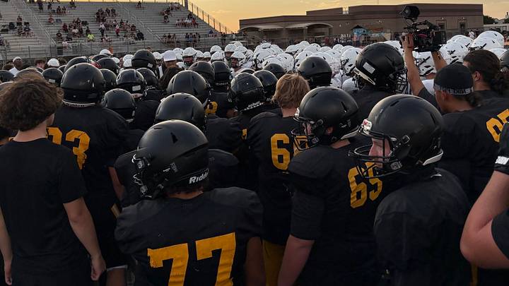 Saguaro High School football huddles up in a 2025 practice. Saguaro High School football huddles up in a 2025 practice.