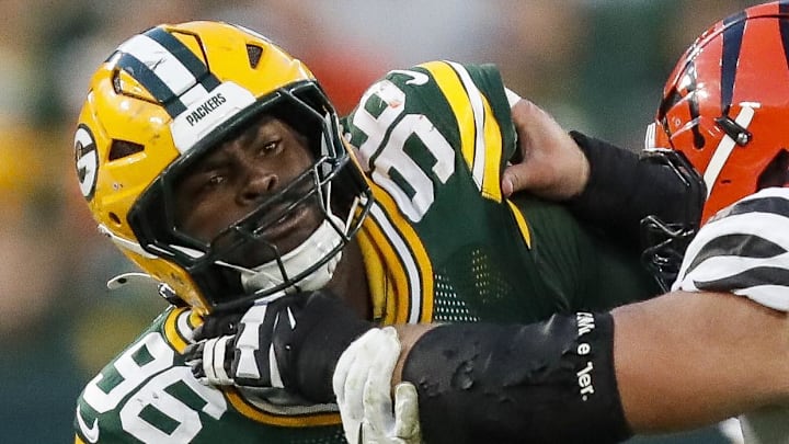 Green Bay Packers defensive lineman Colby Wooden (96) rushes against the Cincinnati Bengals last month. Green Bay Packers defensive lineman Colby Wooden (96) rushes against the Cincinnati Bengals last month.