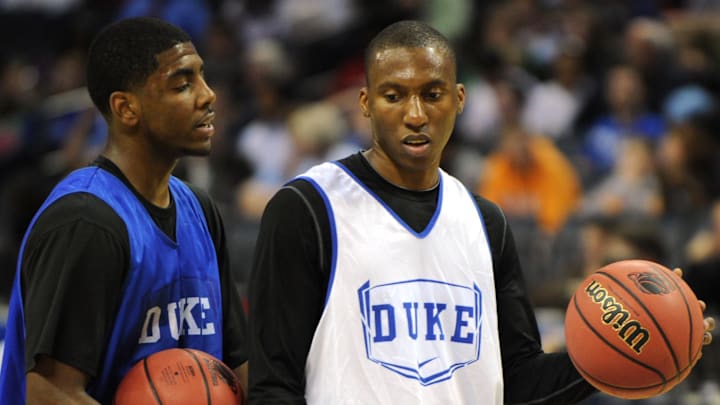 Mar 17, 2011; Charlotte, NC, USA; Duke Blue Devils guards Kyrie Irving (1) and Nolan Smith (2) at practice the day before the second round of the 2011 NCAA men's basketball tournament at the Time Warner Cable Arena. Mandatory Credit: Bob Donnan-Imagn Images