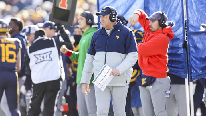 Nov 29, 2025; Morgantown, West Virginia, USA; West Virginia Mountaineers head coach Rich Rodriguez walks along the sidelines during the first quarter against the Texas Tech Red Raiders at Milan Puskar Stadium.