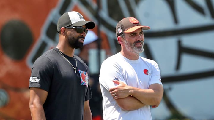 Browns general manager Andrew Berry, left, and head coach Kevin Stefanski watch practice during minicamp, Thursday, June 13, 2024, in Berea.