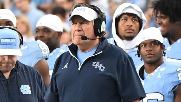 Nov 22, 2025; Chapel Hill, North Carolina, USA; North Carolina Tar Heels head coach Bill Belichick watches play during the first half against the Duke Blue Devils at Kenan Stadium. Mandatory Credit: William Howard-Imagn Images