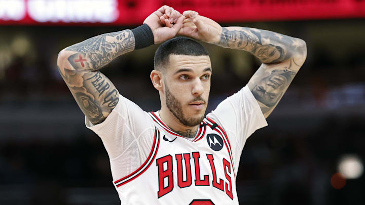 Dec 8, 2024; Chicago, Illinois, USA; Chicago Bulls guard Lonzo Ball (2) reacts during the second half of a basketball game against the Philadelphia 76ers at United Center. Mandatory Credit: Kamil Krzaczynski-Imagn Images