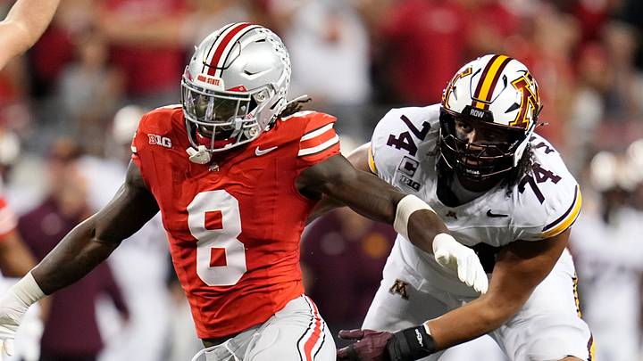 Ohio State Buckeyes linebacker Arvell Reese (8) pressures Minnesota Golden Gophers quarterback Drake Lindsey (5) during the first half of the NCAA football game at Ohio Stadium in Columbus on Oct. 4, 2025.