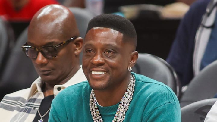 Rapper and entertainer Boosie watches a game
