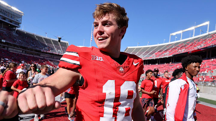 Sep 21, 2024; Columbus, Ohio, USA;  Ohio State Buckeyes quarterback Will Howard (18) celebrates hfollowing the win against the Marshall Thundering Herd at Ohio Stadium. Mandatory Credit: Joseph Maiorana-Imagn Images
