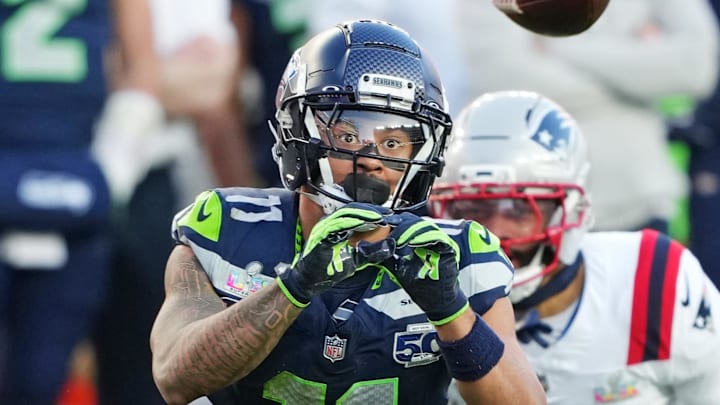 Seattle Seahawks wide receiver Jaxon Smith-Njigba makes a catch against New England Patriots cornerback Carlton Davis III