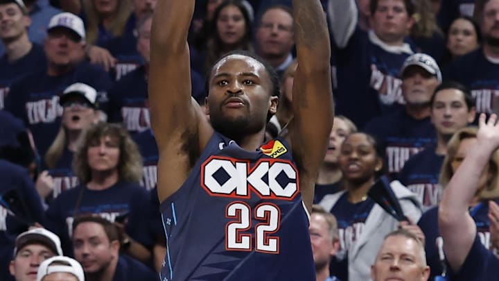 May 7, 2026; Oklahoma City, Oklahoma, USA; Oklahoma City Thunder guard Cason Wallace (22) shoots a three point basket against the Los Angeles Lakers in the second half during game two of the second round of the 2026 NBA Playoffs at Paycom Center. Mandatory Credit: Alonzo Adams-Imagn Images