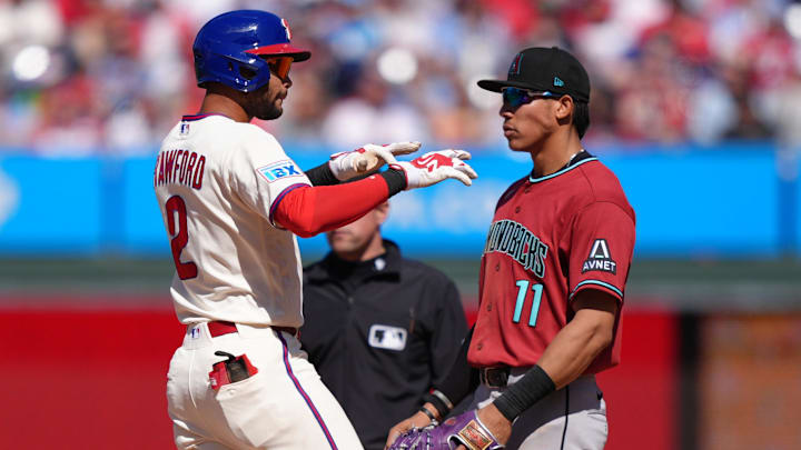 Apr 12, 2026; Philadelphia, Pennsylvania, USA; Philadelphia Phillies outfielder Justin Crawford (2) reacts after hitting a double against the Arizona Diamondbacks in the sixth inning at Citizens Bank Park.