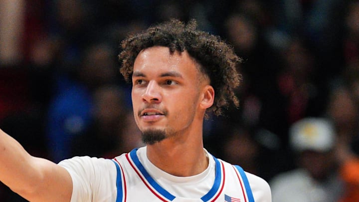 Dec 14, 2024; Lawrence, Kansas, USA; Kansas Jayhawks guard Zeke Mayo (5) reacts during the second half against the North Caroline State Wolfpack at Allen Fieldhouse. Mandatory Credit: Jay Biggerstaff-Imagn Images Dec 14, 2024; Lawrence, Kansas, USA; Kansas Jayhawks guard Zeke Mayo (5) reacts during the second half against the North Caroline State Wolfpack at Allen Fieldhouse. Mandatory Credit: Jay Biggerstaff-Imagn Images