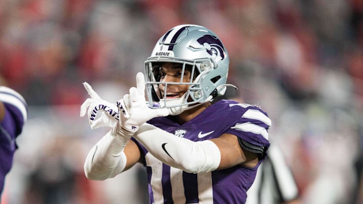 Dec 28, 2023; Orlando, FL, USA; Kansas State cornerback Jacob Parrish (10) celebrates an interception against NC State in the fourth quarter at Camping World Stadium. Mandatory Credit: Jeremy Reper-Imagn Images Dec 28, 2023; Orlando, FL, USA; Kansas State cornerback Jacob Parrish (10) celebrates an interception against NC State in the fourth quarter at Camping World Stadium. Mandatory Credit: Jeremy Reper-Imagn Images