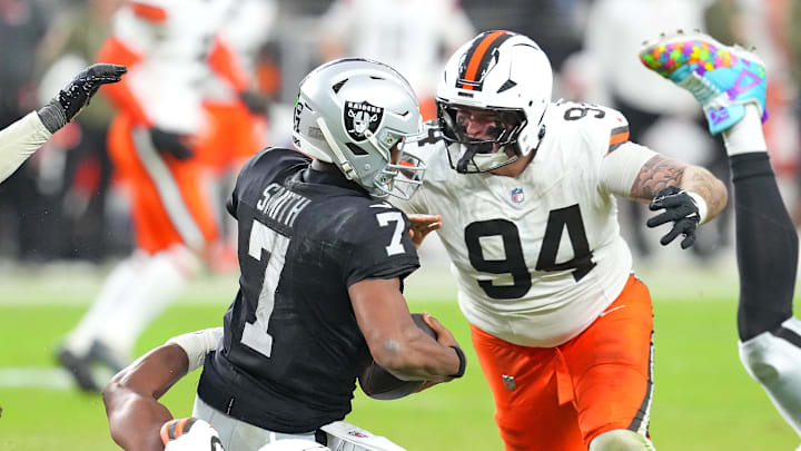 Nov 23, 2025; Paradise, Nevada, USA; Las Vegas Raiders quarterback Geno Smith (7) is sacked by Cleveland Browns defensive end Myles Garrett (95) as defensive tackle Mason Graham (94) looks make a tackle on the play during the fourth quarter at Allegiant Stadium. Mandatory Credit: Stephen R. Sylvanie-Imagn Images Nov 23, 2025; Paradise, Nevada, USA; Las Vegas Raiders quarterback Geno Smith (7) is sacked by Cleveland Browns defensive end Myles Garrett (95) as defensive tackle Mason Graham (94) looks make a tackle on the play during the fourth quarter at Allegiant Stadium. Mandatory Credit: Stephen R. Sylvanie-Imagn Images