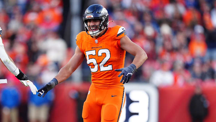 Nov 17, 2024; Denver, Colorado, USA; Denver Broncos linebacker Jonah Elliss (52) and linebacker Justin Strnad (40) celebrate a play in the second half against the Atlanta Falcons at Empower Field at Mile High. 