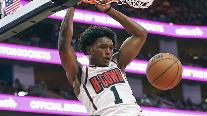 Dec 27, 2024; Houston, Texas, USA; Houston Rockets forward Amen Thompson (1) dunks the ball during the third quarter against the Minnesota Timberwolves at Toyota Center. Mandatory Credit: Troy Taormina-Imagn Images