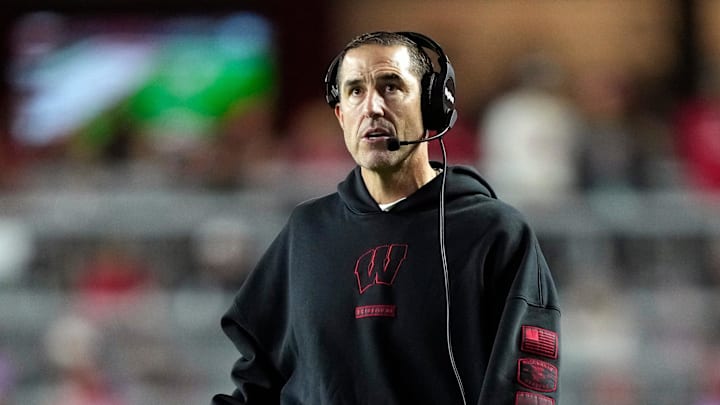 Nov 22, 2025; Madison, Wisconsin, USA; Wisconsin Badgers head coach Luke Fickell looks on during a timeout  in the second half against the Illinois Fighting Illini at Camp Randall Stadium. 