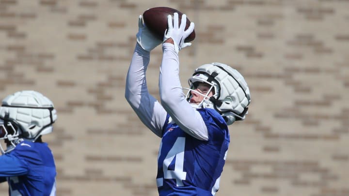 Bills defensive backs Cole Bishop, right, and Ja'Marcus Ingram pull in throws during interception drills. Bills defensive backs Cole Bishop, right, and Ja'Marcus Ingram pull in throws during interception drills.