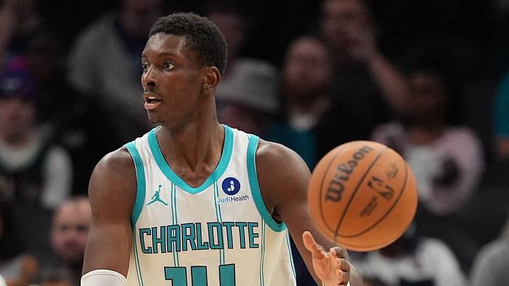 Charlotte Hornets forward Moussa Diabate (14) passes off to guard Dennis Schroder Charlotte Hornets forward Moussa Diabate (14) passes off to guard Dennis Schroder