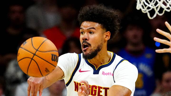 Oct 4, 2026; Boulder, Colorado, USA;  Denver Nuggets forward Cameron Johnson (23) passes the ball in the first half against the Utah Jazz at CU Events Center.  Mandatory Credit: Ron Chenoy-Imagn Images