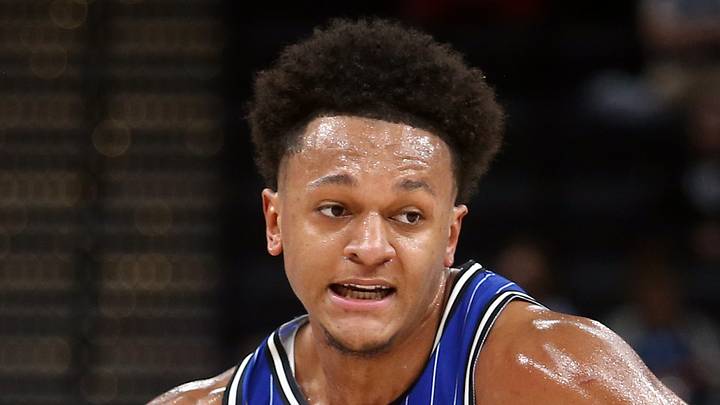 Oct 7, 2026; Memphis, Tennessee, USA; Orlando Magic forward Paolo Banchero (5) drives to the basket during the first quarter against the Memphis Grizzlies at FedExForum. Mandatory Credit: Petre Thomas-Imagn Images
