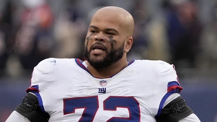 Nov 9, 2025; Chicago, Illinois, USA; New York Giants offensive tackle Jermaine Eluemunor (72) leaves the field after losing to the Chicago Bears at Soldier Field. Mandatory Credit: David Banks-Imagn Images