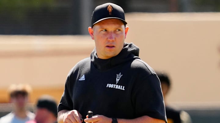 Arizona State head coach Kenny Dillingham watches his team as they run drills during a spring practice at Kajikawa practice fields in Tempe, Ariz. on April 14, 2026.