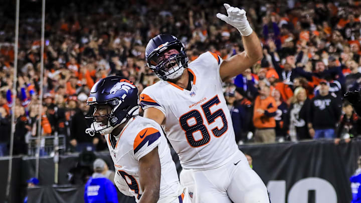 Dec 28, 2024; Cincinnati, Ohio, USA; Denver Broncos wide receiver Marvin Mims Jr. (19) reacts after scoring a touchdown with tight end Lucas Krull (85) against the Cincinnati Bengals in the second half at Paycor Stadium. 