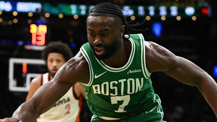Dec 4, 2024; Boston, Massachusetts, USA; Boston Celtics guard Jaylen Brown (7) reaches for a loose ball against the Detroit Pistons during the third quarter at the TD Garden. Mandatory Credit: Brian Fluharty-Imagn Images Dec 4, 2024; Boston, Massachusetts, USA; Boston Celtics guard Jaylen Brown (7) reaches for a loose ball against the Detroit Pistons during the third quarter at the TD Garden. Mandatory Credit: Brian Fluharty-Imagn Images