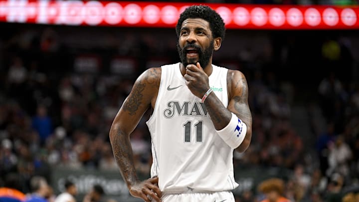 Nov 27, 2024; Dallas, Texas, USA; Dallas Mavericks guard Kyrie Irving (11) walks back up the court during the first quarter against the New York Knicks at the American Airlines Center. Mandatory Credit: Jerome Miron-Imagn Images