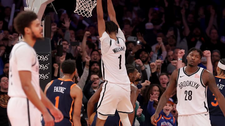 Nov 15, 2024; New York, New York, USA; Brooklyn Nets guard Dennis Schroder (17) and forwards Cameron Johnson (2) and Ziaire Williams (1) and Dorian Finney-Smith (28) react after losing to the New York Knicks at Madison Square Garden. Mandatory Credit: Brad Penner-Imagn Images