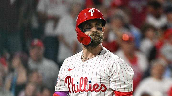 Oct 6, 2025; Philadelphia, Pennsylvania, USA; Philadelphia Phillies first baseman Bryce Harper (3) reacts to striking out against the Los Angeles Dodgers in the sixth inning during game two of the NLDS round for the 2025 MLB playoffs at Citizens Bank Park. Mandatory Credit: Eric Hartline-Imagn Images