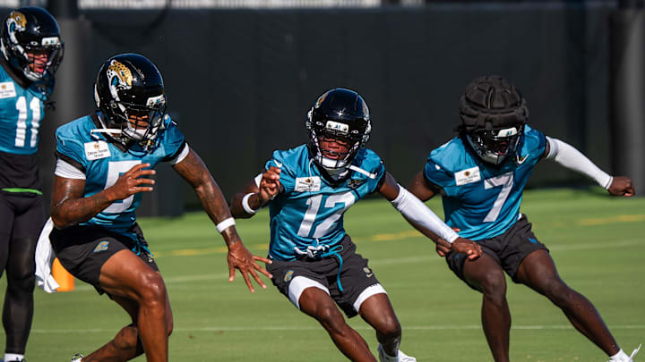 Jacksonville Jaguars wide receiver Dyami Brown (5), Jacksonville Jaguars wide receiver Travis Hunter (12) and Jacksonville Jaguars wide receiver Brian Thomas Jr. (7) run a drill during an NFL training camp second session at the Miller Electric Center, Thursday, July 24, 2025, in Jacksonville, Fla. [Doug Engle/Florida Times-Union]