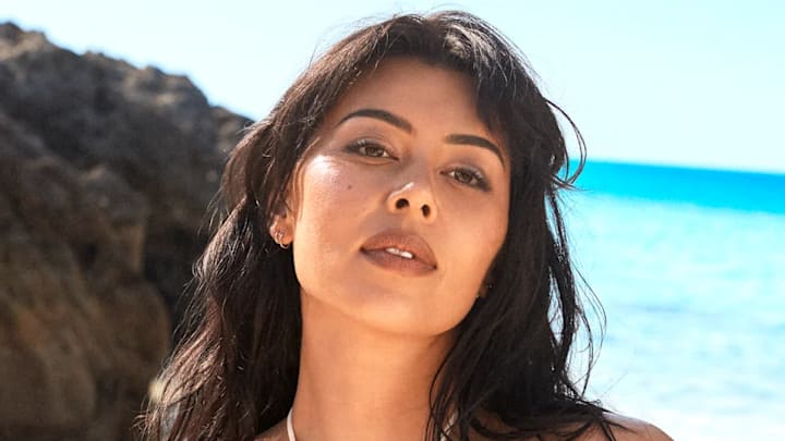 Lauren Chan was photographed by Ben Watts in Bermuda. Swimsuit by Mare Perpetua.