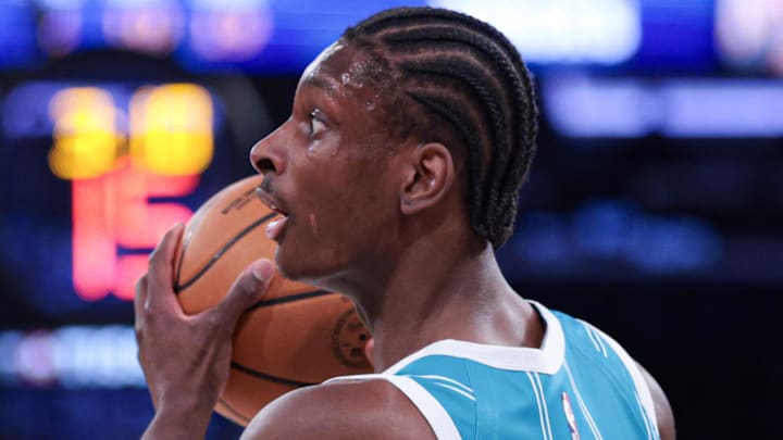 Apr 12, 2026; New York, New York, USA; Charlotte Hornets forward Moussa Diabate (14) looks to pass against the New York Knicks during the first half at Madison Square Garden. Mandatory Credit: Vincent Carchietta-Imagn Images