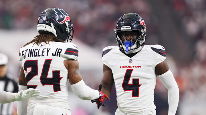 Sep 15, 2025; Houston, Texas, USA; Houston Texans cornerback Kamari Lassiter (4) celebrates with Houston Texans cornerback Derek Stingley Jr. (24) after making a stop during the second quarter at NRG Stadium. Mandatory Credit: Troy Taormina-Imagn Images Sep 15, 2025; Houston, Texas, USA; Houston Texans cornerback Kamari Lassiter (4) celebrates with Houston Texans cornerback Derek Stingley Jr. (24) after making a stop during the second quarter at NRG Stadium. Mandatory Credit: Troy Taormina-Imagn Images