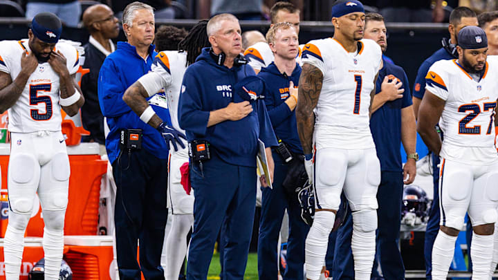 Aug 23, 2025; New Orleans, Louisiana, USA; Denver Broncos head coach Sean Payton during the national anthem against the New Orleans Saints during the first half at Caesars Superdome. 