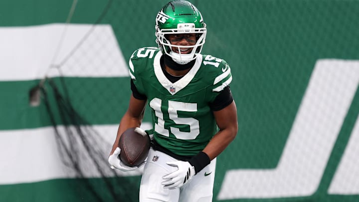 Jets wide receiver Adonai Mitchell reacts after a touchdown catch.