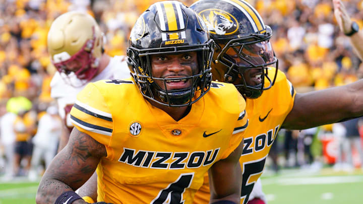 Sep 14, 2024; Columbia, Missouri, USA; Missouri Tigers safety Tre'Vez Johnson (4) celebrates after an interception against the Boston College Eagles during the first half at Faurot Field at Memorial Stadium.