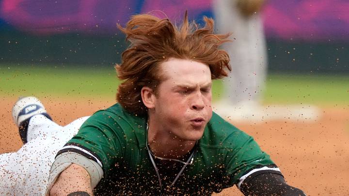 June 4, 2025; North Augusta, South Carolina, USA; Augusta GreenJacket outfielder Owen Carey (24) slides into third base during the second game of the Augusta GreenJacket and Fayetteville series at SRP Park. Mandatory Credit: Katie Goodale - Augusta Chronicle/USA TODAY NETWORK