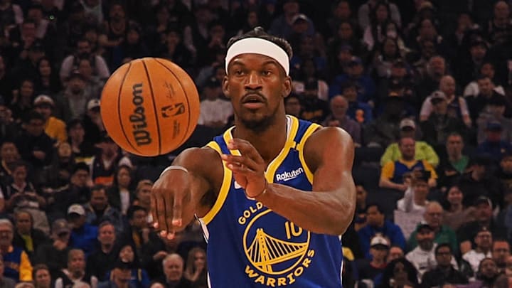 Golden State Warriors forward Jimmy Butler passes the ball.