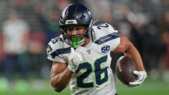 Jan 3, 2026; Santa Clara, California, USA; Seattle Seahawks running back Zach Charbonnet (26) rushes the ball against the San Francisco 49ers during the first half at Levi's Stadium.