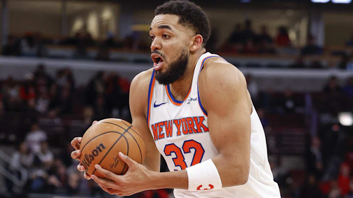 Feb 22, 2026; Chicago, Illinois, USA; New York Knicks center Karl-Anthony Towns (32) goes to the basket against the Chicago Bulls during the second half at United Center.