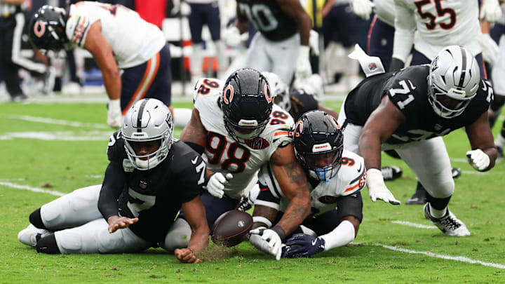 Sep 28, 2025; Paradise, Nevada, USA; Las Vegas Raiders quarterback Geno Smith (7), offensive tackle DJ Glaze (71), Chicago Bears defensive end Montez Sweat (98) and safety Jaquan Brisker (9) scramble for a loose ball after a sack in the first quarter at Allegiant Stadium. Mandatory Credit: Kiyoshi Mio-Imagn Images Sep 28, 2025; Paradise, Nevada, USA; Las Vegas Raiders quarterback Geno Smith (7), offensive tackle DJ Glaze (71), Chicago Bears defensive end Montez Sweat (98) and safety Jaquan Brisker (9) scramble for a loose ball after a sack in the first quarter at Allegiant Stadium. Mandatory Credit: Kiyoshi Mio-Imagn Images