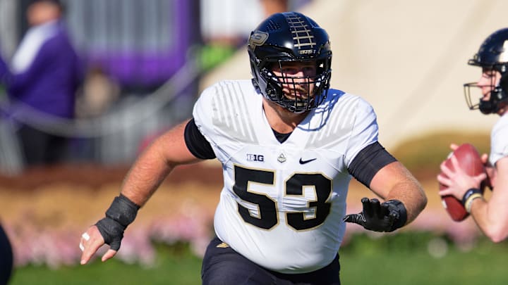 Purdue Boilermakers offensive lineman Gus Hartwig (53) blocks against the Northwestern Purdue Boilermakers offensive lineman Gus Hartwig (53) blocks against the Northwestern