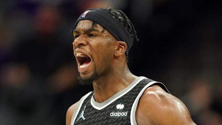 Dec 4, 2021; Sacramento, California, USA; Sacramento Kings guard Terence Davis (3) reacts after hitting a three point basket against the LA Clippers during the third quarter at Golden 1 Center. Mandatory Credit: Darren Yamashita-Imagn Images
