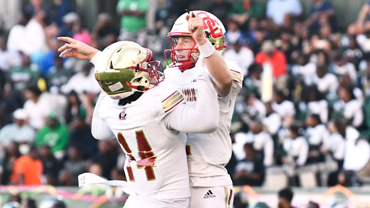 Bergen Catholic's Trey Tagliaferri, right, celebrates with teammate Jamal Hammary after Bergen Catholic scored a touchdown during the football game between Bergen Catholic and Winslow played at Winslow Township High School on Friday, September 12, 2025.