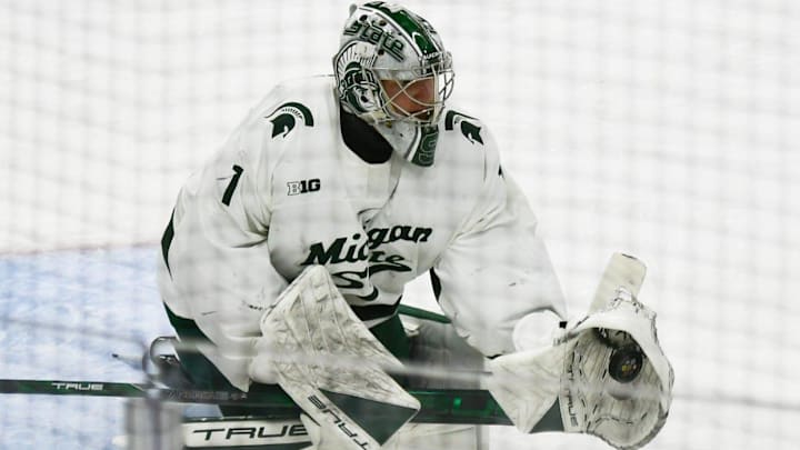 MSU's Trey Augustine works the net against Ohio State, Saturday, March 22, 2025, during the second period of the Big 10 Hockey final at Munn Ice Arena.