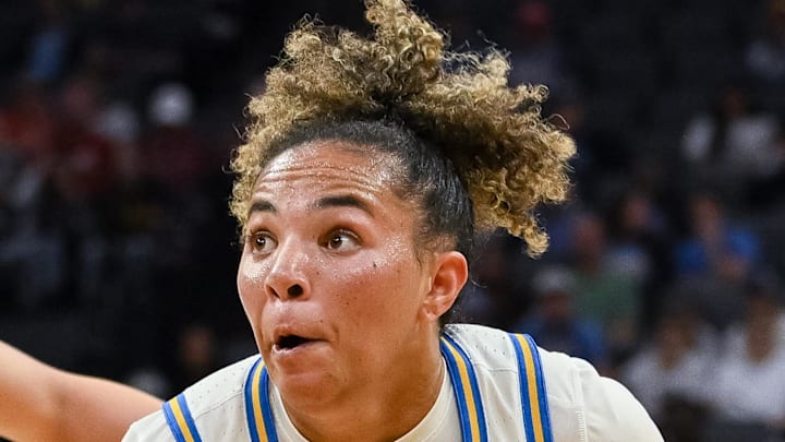 Mar 27, 2026; Sacramento, CA, USA; UCLA Bruins guard Kiki Rice (1) drives against Minnesota Golden Gophers guard Brylee Glenn (12) during a Sweet Sixteen game of the Sacramento Regional 2 of the women's 2026 NCAA Tournament at Golden 1 Center. Mandatory Credit: Ed Szczepanski-Imagn Images